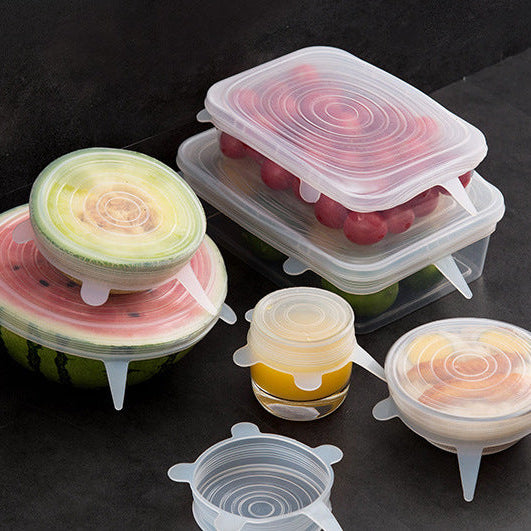 Set of silicone food covers on a dark surface