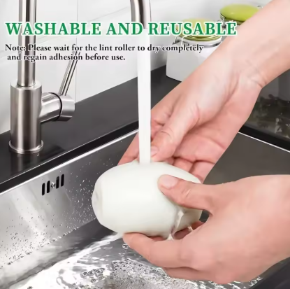 Person washing a white Portable Pet Hair Roller under running water in a kitchen sink.